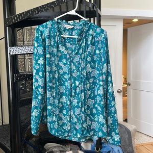 Floral blue full sleeve blouse. Great for work wear and evening too.